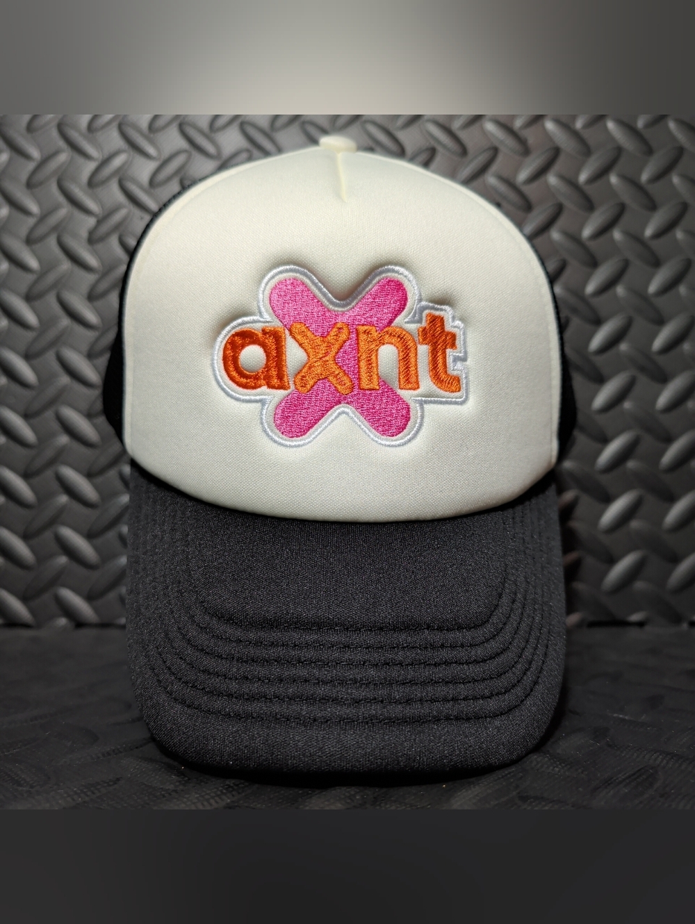 AXNT snapback trucker hat new with original insert